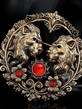 Vintage-Inspired Gold Tone Double Lion Brooch with Red Cabochons
